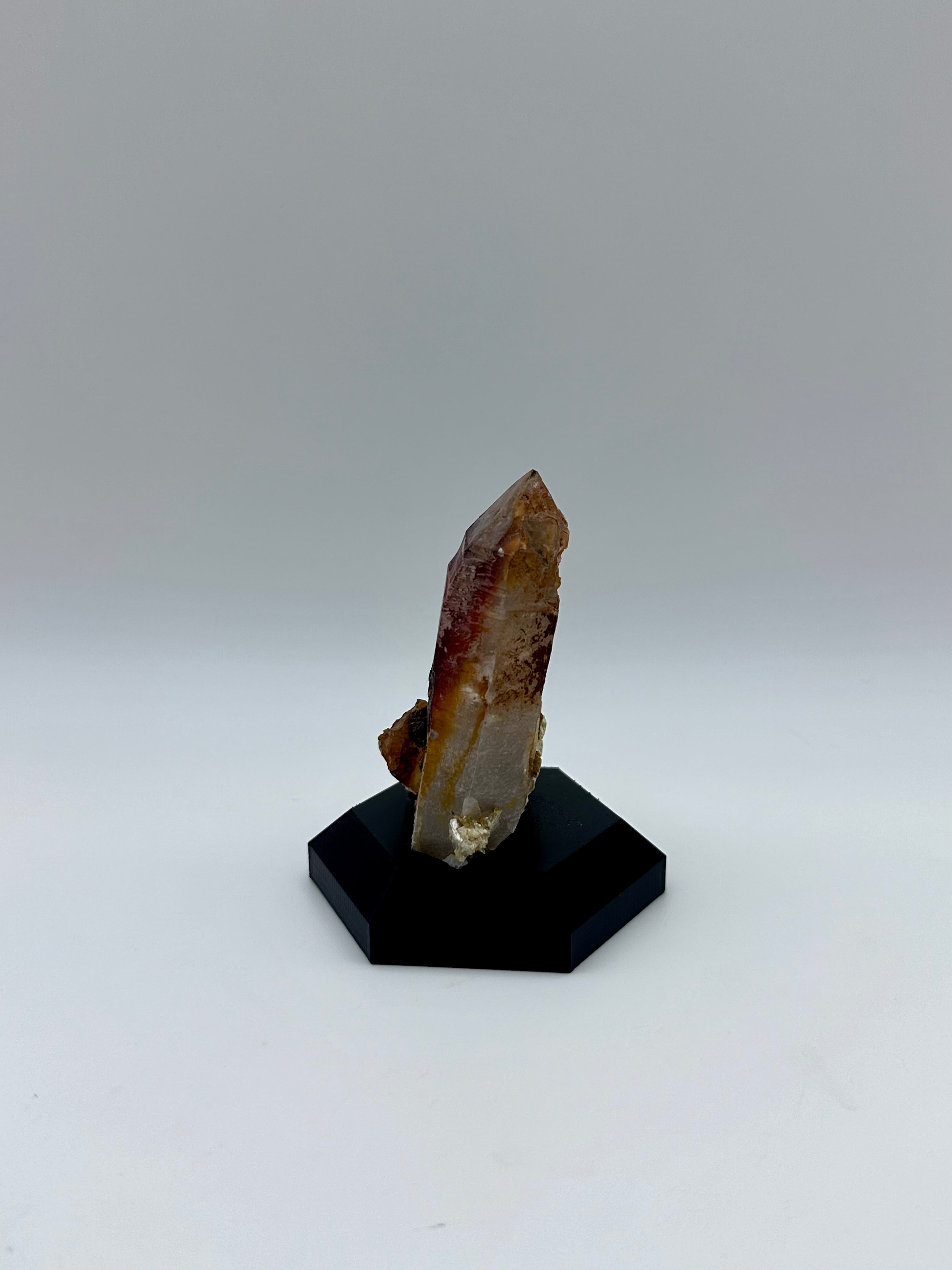 Hematoid Quartz Crystal Point on Custom Black Hex Base